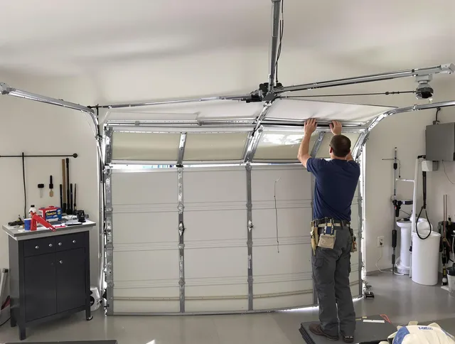 Shaker Heights Garage Door Repair specialist performing precise section replacement on Shaker Heights garage door