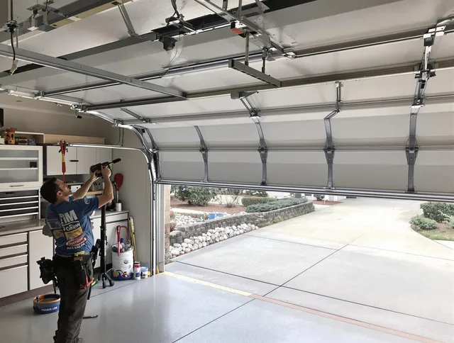 Garage door track repair service by Shaker Heights Garage Door Repair in Shaker Heights